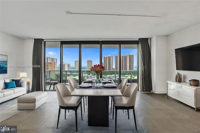 dining space featuring expansive windows