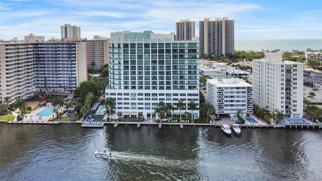 view of building exterior with a water view