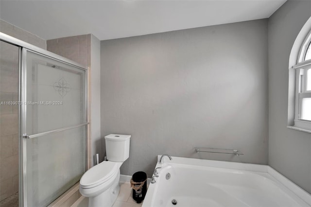 bathroom with toilet, independent shower and bath, and tile patterned floors