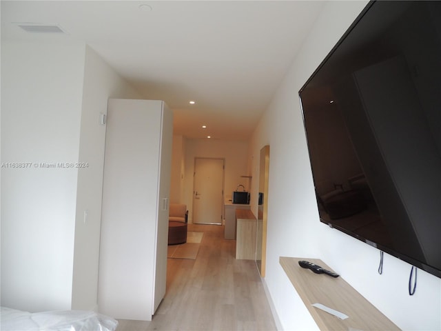 hallway featuring light wood-type flooring