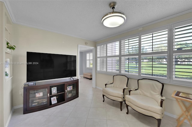 tiled living room featuring crown molding and a textured ceiling