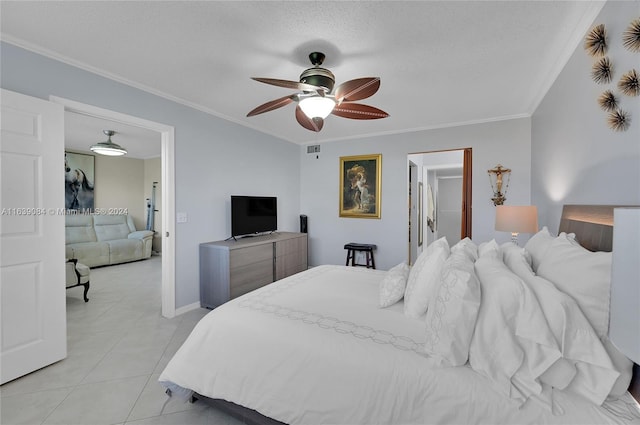 tiled bedroom featuring crown molding and ceiling fan