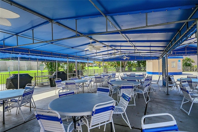 view of patio / terrace featuring area for grilling and fence