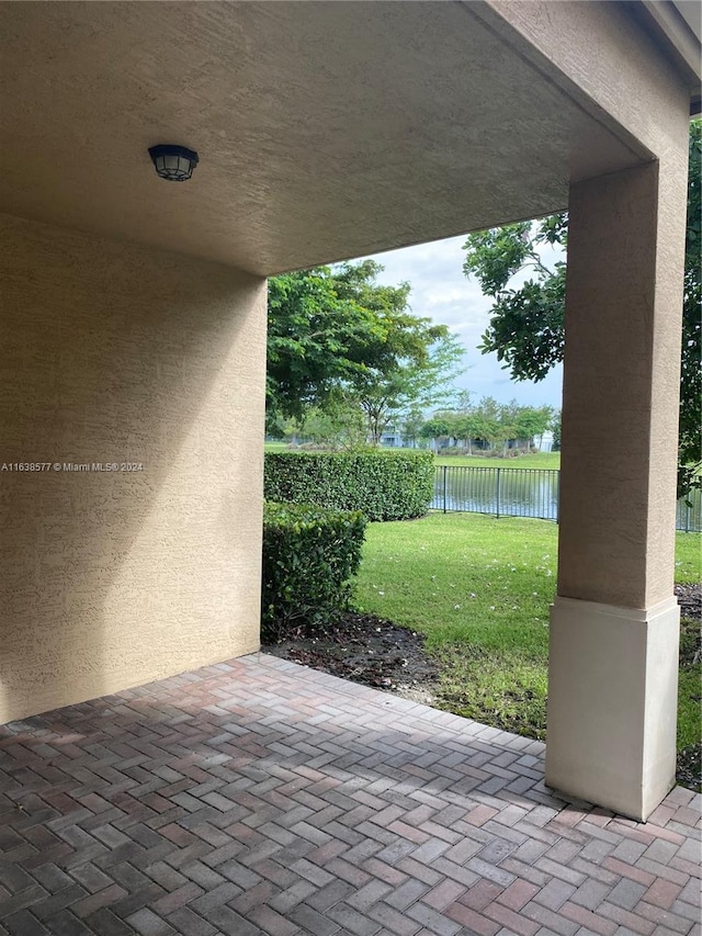 view of patio / terrace featuring a water view