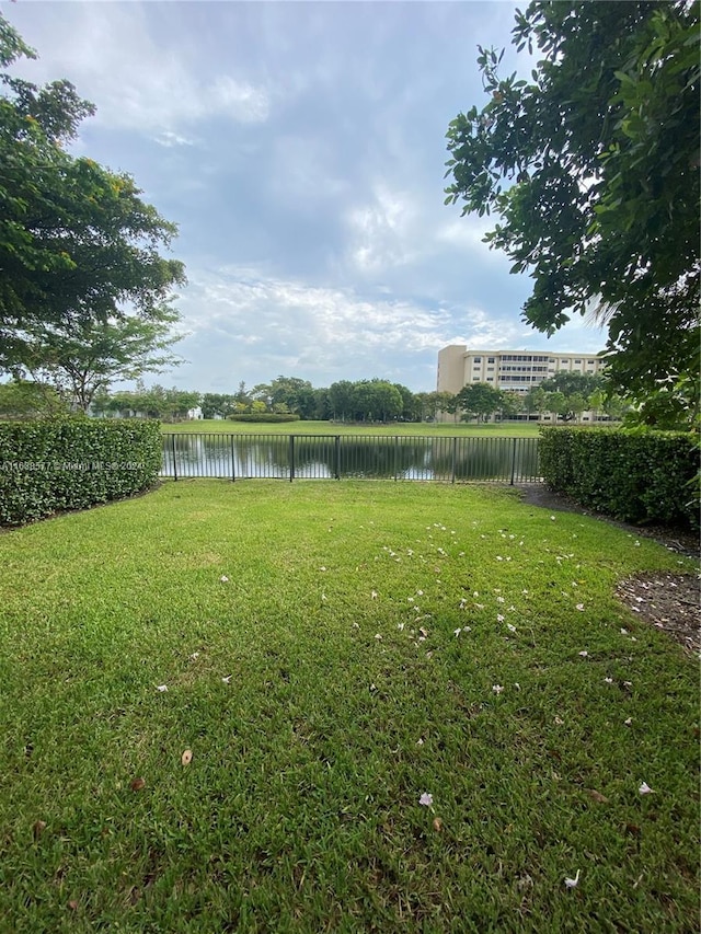 view of yard with a water view