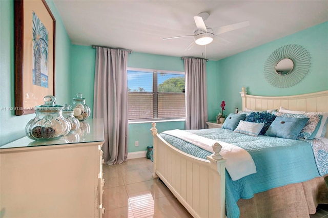 bedroom featuring ceiling fan and light tile patterned floors