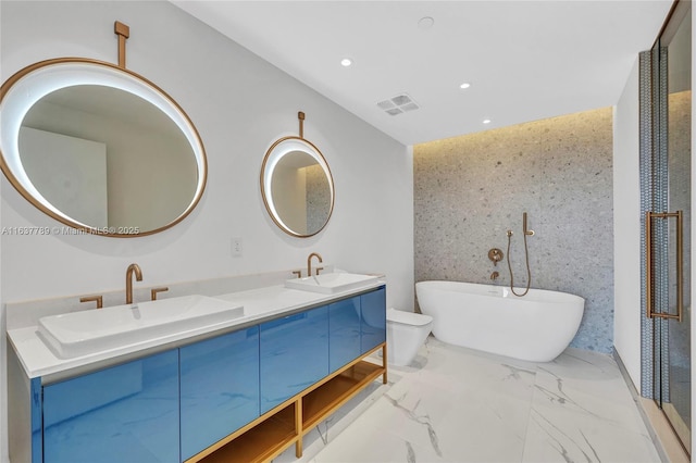 bathroom with double vanity, visible vents, marble finish floor, and a sink