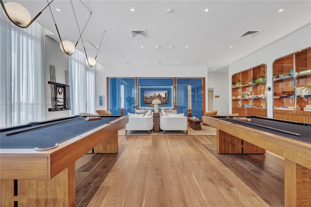 recreation room with visible vents, wood finished floors, and pool table