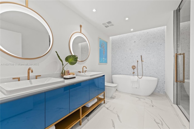 bathroom featuring recessed lighting, visible vents, marble finish floor, and a sink