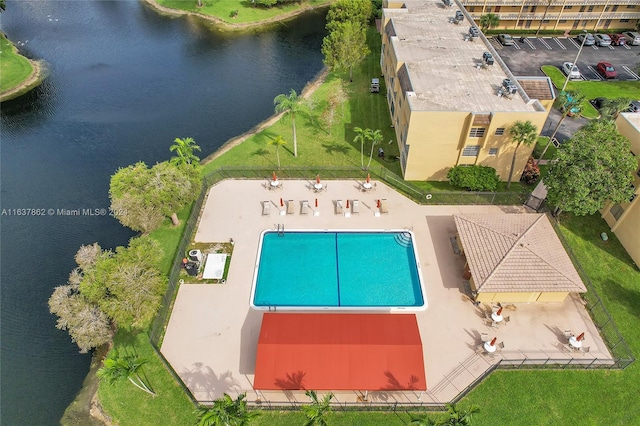 birds eye view of property featuring a water view