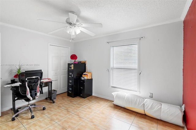 tiled office with a textured ceiling, ornamental molding, and ceiling fan