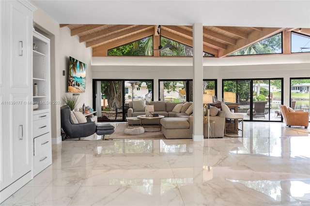 living room featuring beamed ceiling, high vaulted ceiling, and wooden ceiling