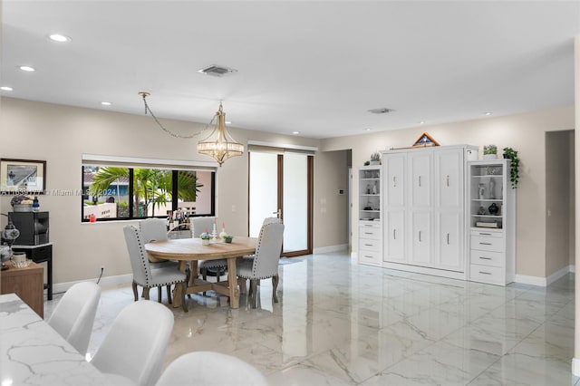 dining space featuring a barn door