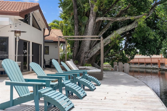 deck featuring a water view