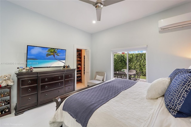 bedroom with light tile patterned floors, access to outside, a closet, ceiling fan, and a wall unit AC