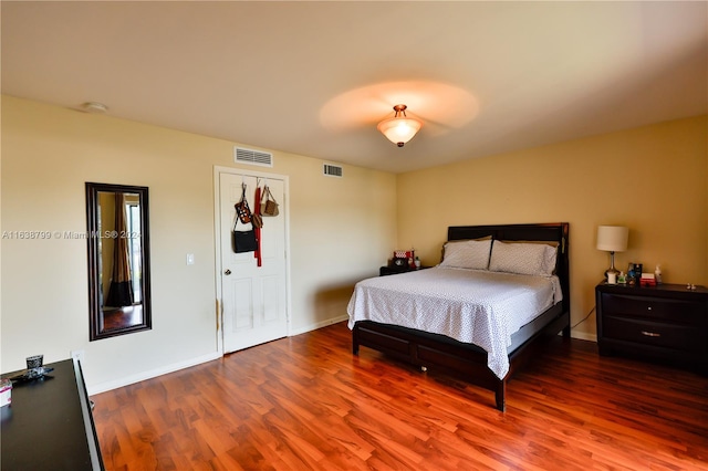 bedroom featuring hardwood / wood-style floors