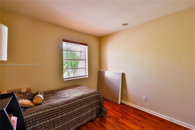 bedroom featuring hardwood / wood-style floors