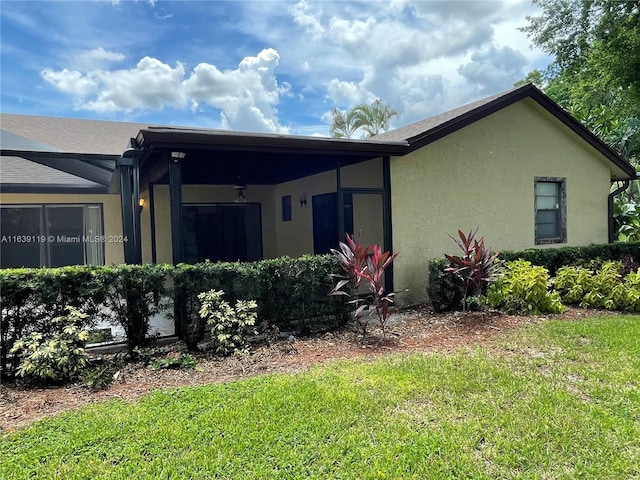 exterior space featuring a front yard