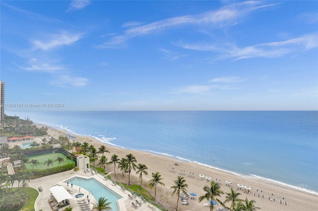 bird's eye view featuring a beach view and a water view