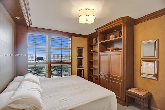 bedroom with ornamental molding