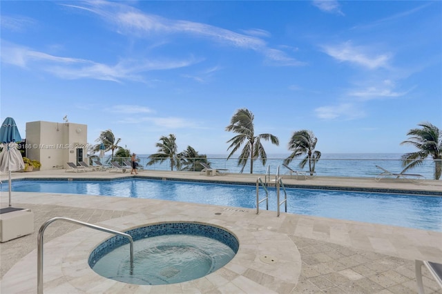 view of pool with a community hot tub