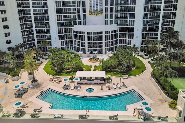 view of swimming pool with a patio area