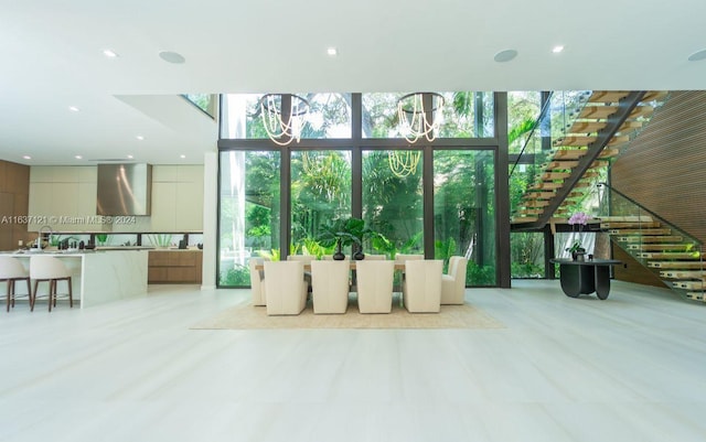 unfurnished living room featuring plenty of natural light and expansive windows