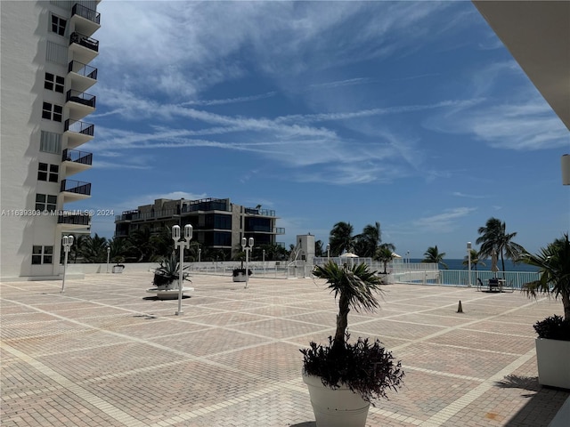 view of sport court with basketball hoop