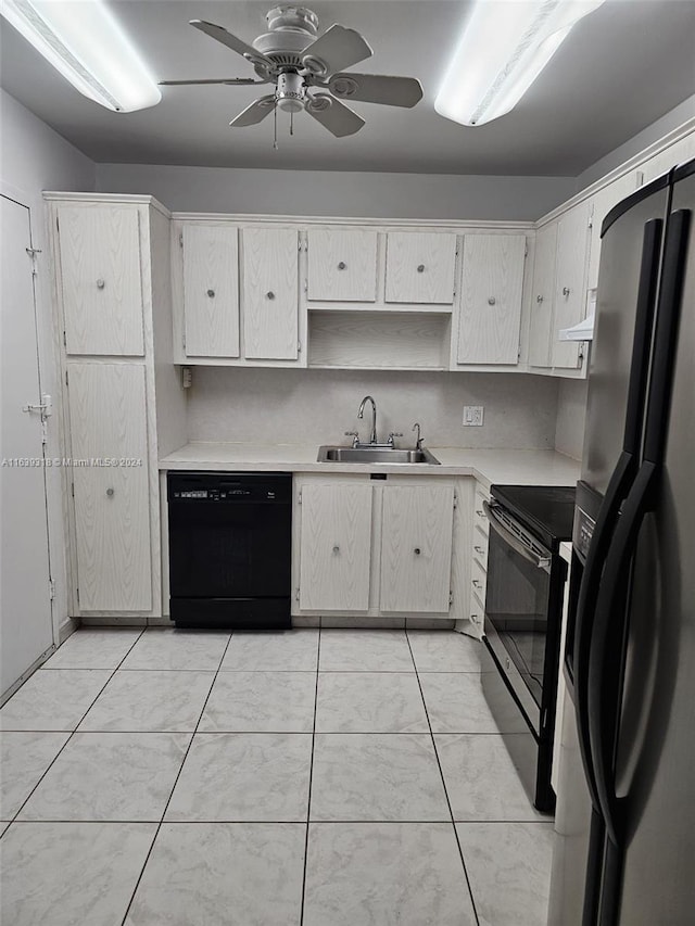 kitchen featuring ceiling fan, white cabinets, light tile patterned floors, sink, and black appliances