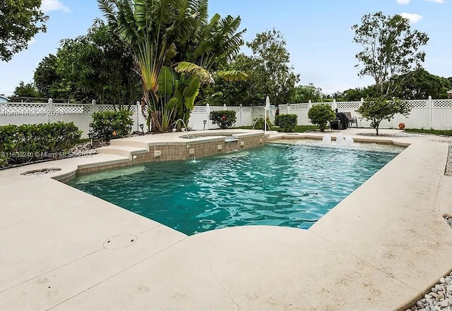 view of pool featuring an in ground hot tub, a patio area, a fenced backyard, and a fenced in pool