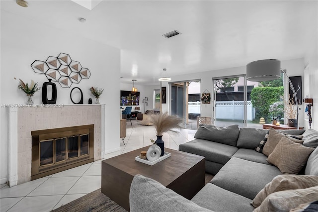 living room with light tile patterned flooring