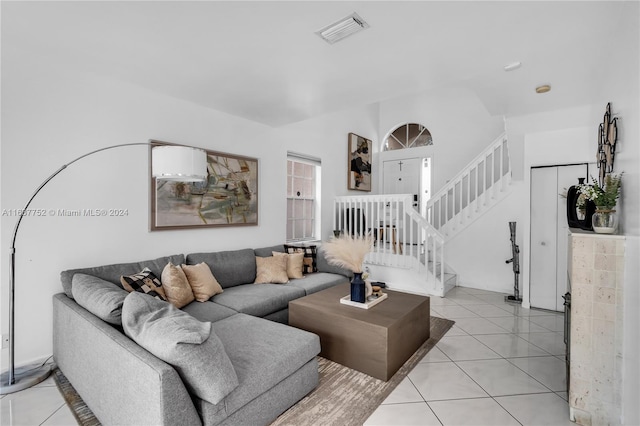 living room with light tile patterned flooring