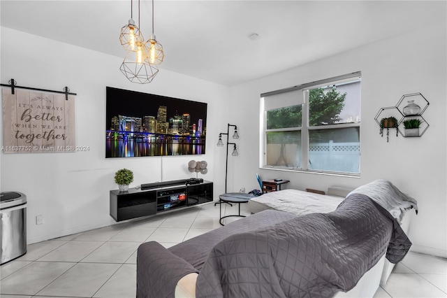 tiled living room featuring a barn door