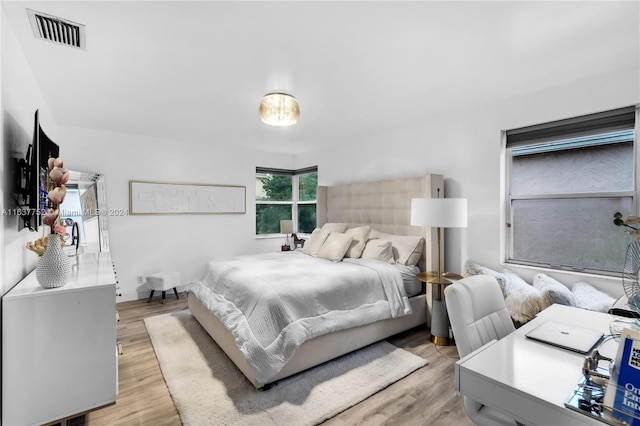 bedroom featuring light hardwood / wood-style floors