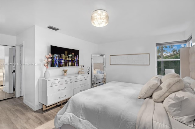 bedroom featuring light hardwood / wood-style floors