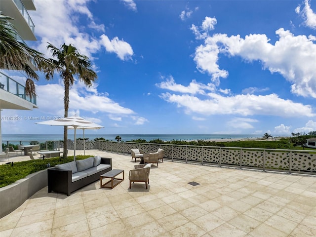 view of patio featuring an outdoor hangout area and a water view