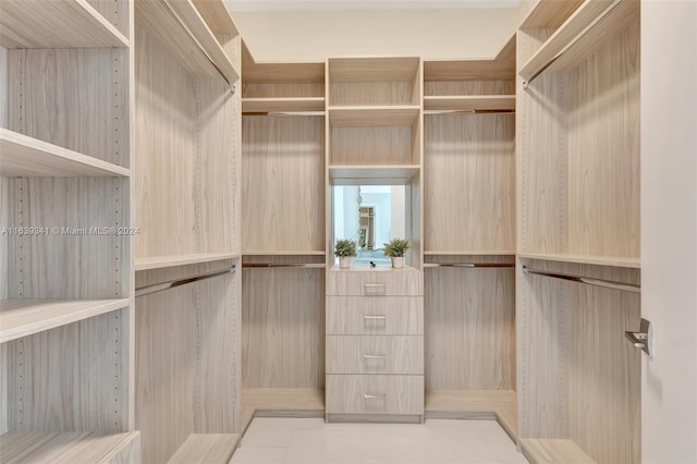 walk in closet featuring tile patterned floors