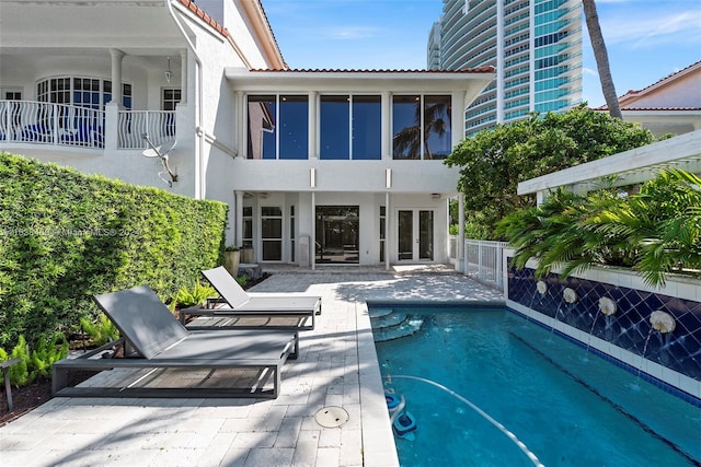 view of pool featuring a patio area