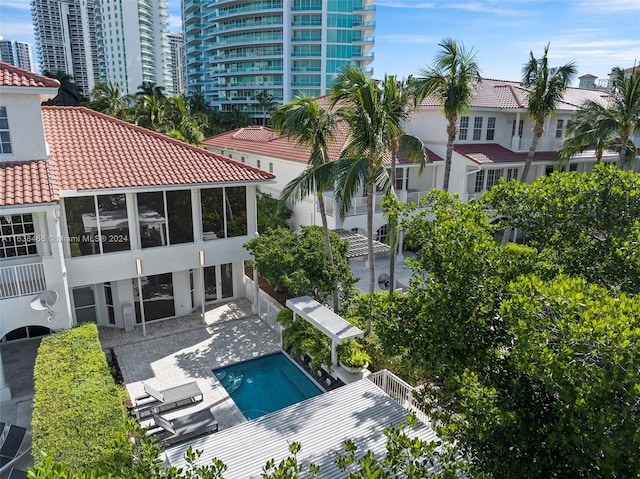 view of swimming pool featuring a patio area