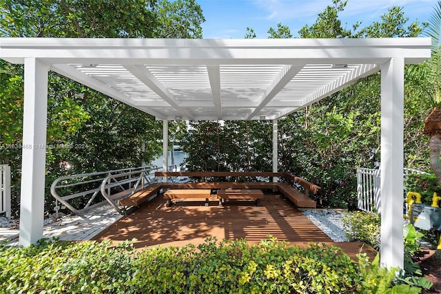 view of patio / terrace with a deck and a pergola