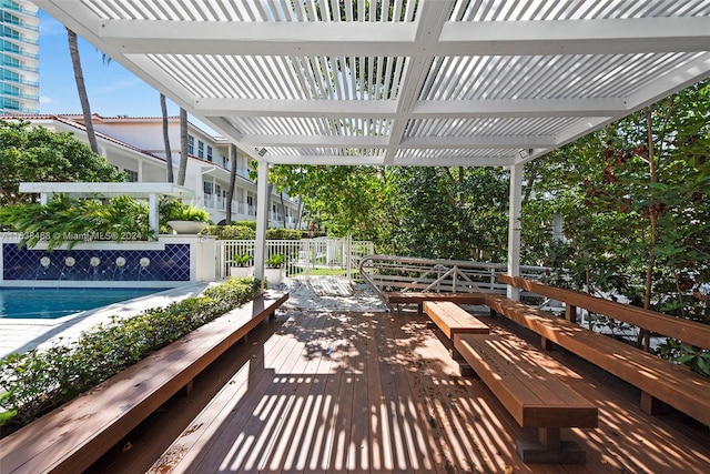 view of patio with a pergola and a swimming pool side deck