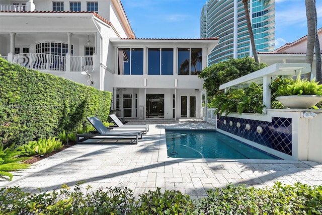 view of pool featuring a patio area