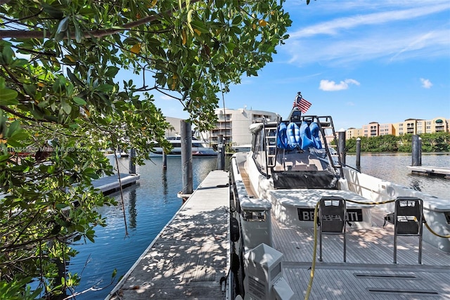 view of dock with a water view