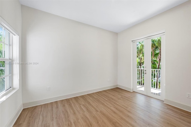 empty room with light wood-type flooring