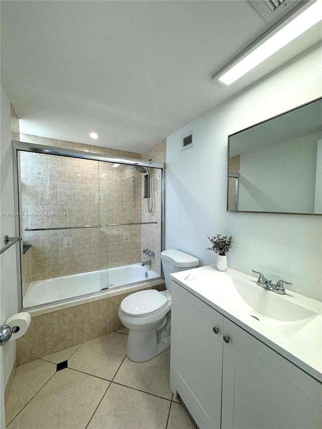 9195 Collins Ave Unit 801, Surfside, FL 33154 - full bathroom with vanity, toilet, tile patterned floors, tiled shower / bath combo, and visible vents