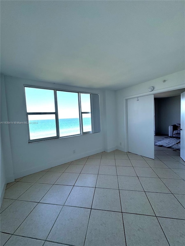 9195 Collins Ave Unit 801, Surfside, FL 33154 - unfurnished room with light tile patterned flooring