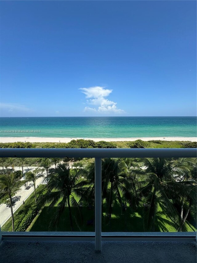 9195 Collins Ave Unit 801, Surfside, FL 33154 - property view of water featuring a view of the beach