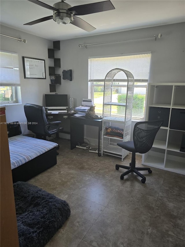 tiled office space with ceiling fan and a wealth of natural light