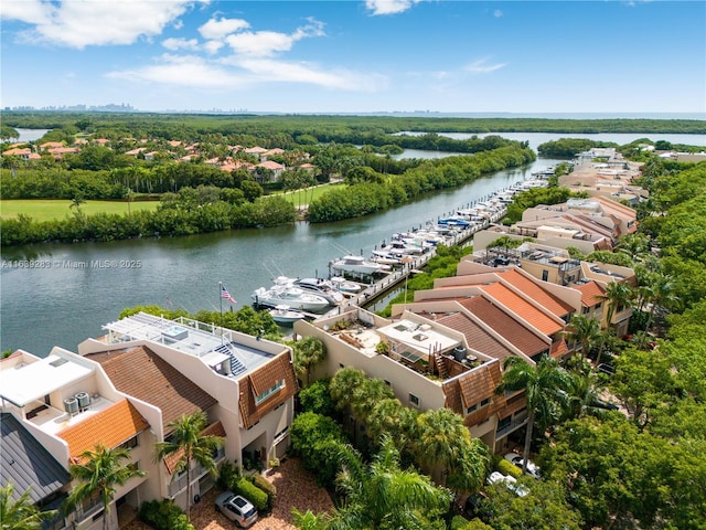 birds eye view of property featuring a water view