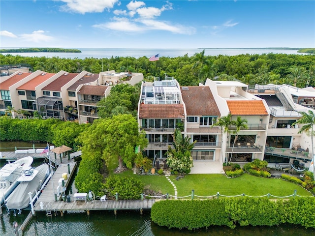 drone / aerial view with a water view